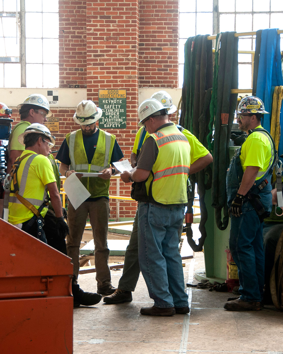 group of men in safety vests and hard hats